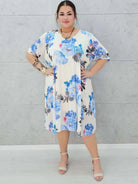 Plisowana sukienka w kwiaty z dekoltem V –moda dla kobiet plus size Stylowa XL