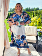 Satynowa sukienka z subtelnym połyskiem w kilku kolorach Stylowa XL