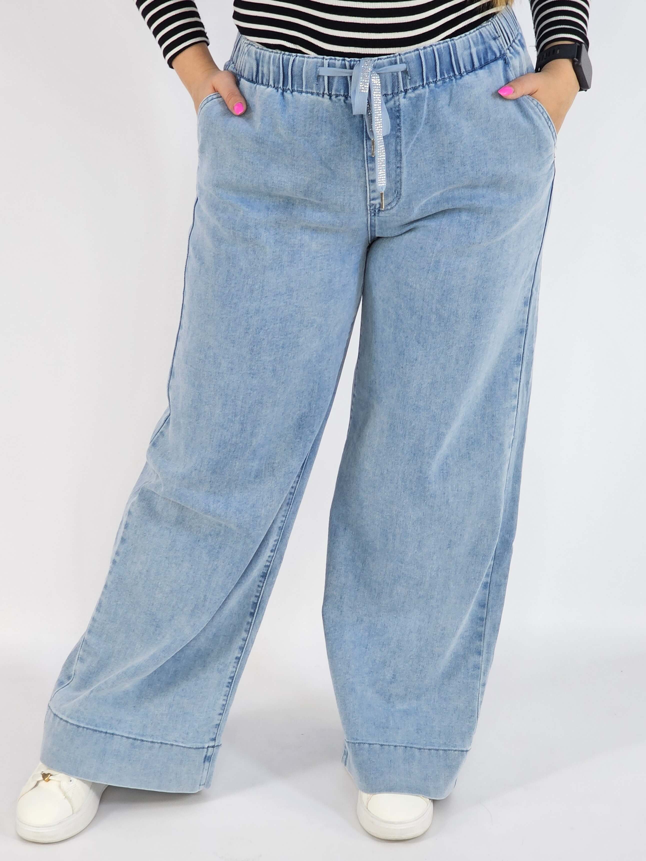 Spodnie Plus Size Jasne Jeansy z Gumką w Pasie – Wygodne i Stylowe XXL Stylowa XL