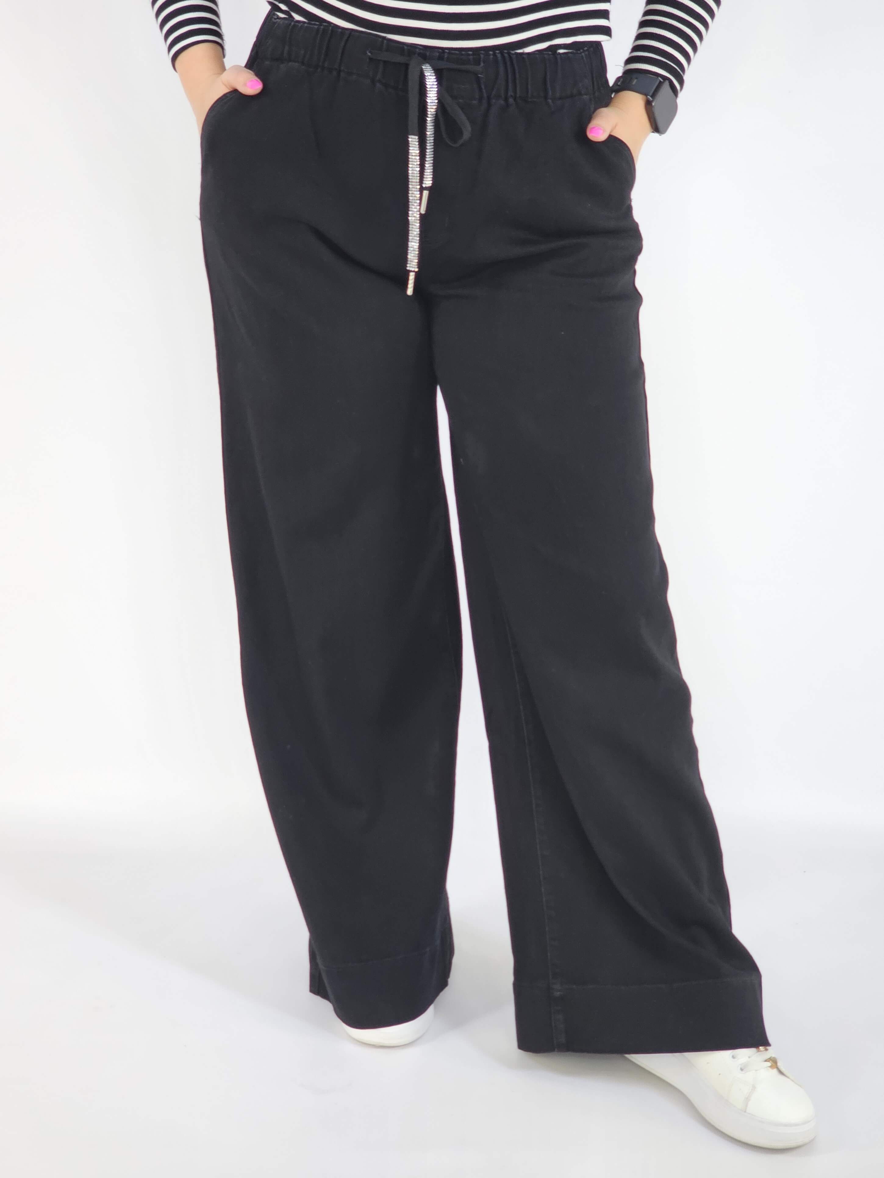 Spodnie jeans plus size – czarne szerokie spodnie z wiązaniem Stylowa XL
