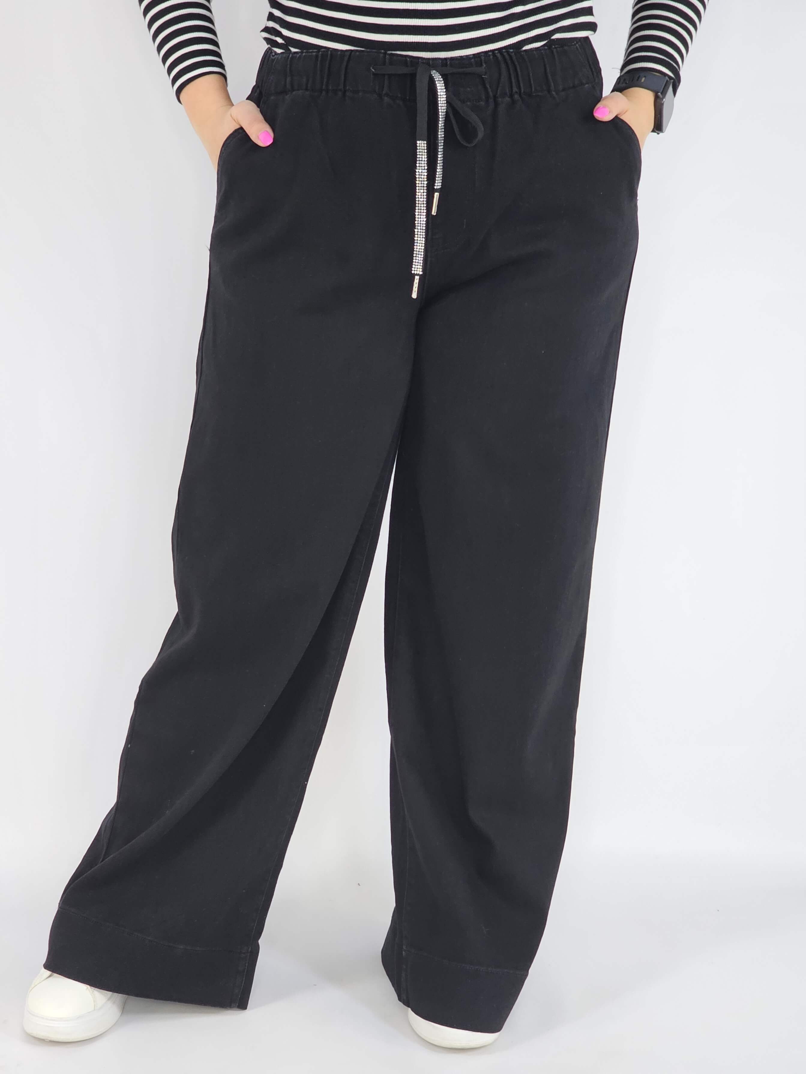 Spodnie jeans plus size – czarne szerokie spodnie z wiązaniem Stylowa XL