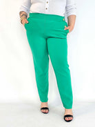 Spodnie plus size – eleganckie spodnie XXL zielone z ozdobnymi guzikami Stylowa XL