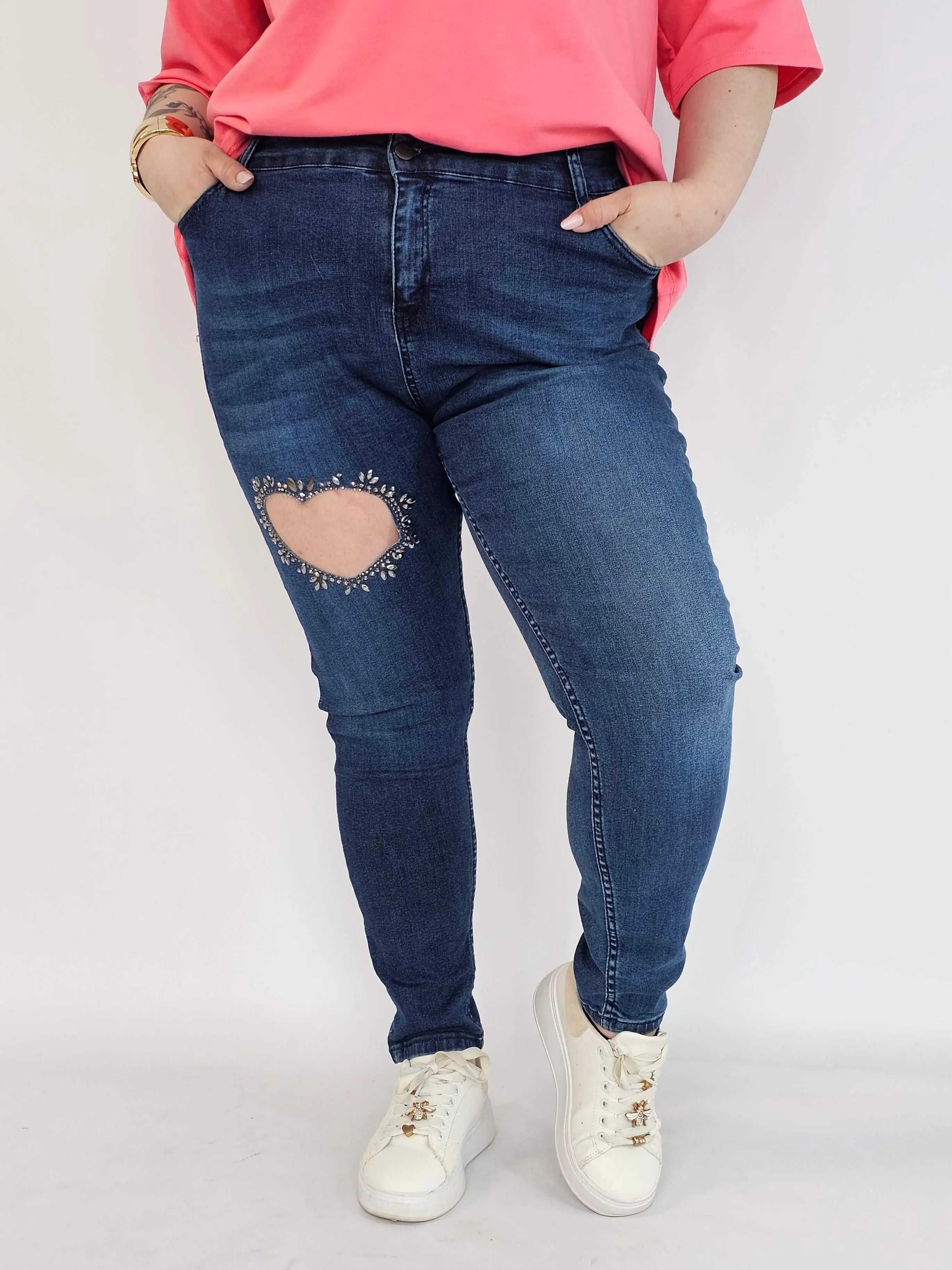 Spodnie plus size jeans – elastyczne jeansy damskie XXL z ozdobnym wycięciem Stylowa XL