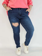 Spodnie plus size jeans – elastyczne jeansy damskie XXL z ozdobnym wycięciem Stylowa XL