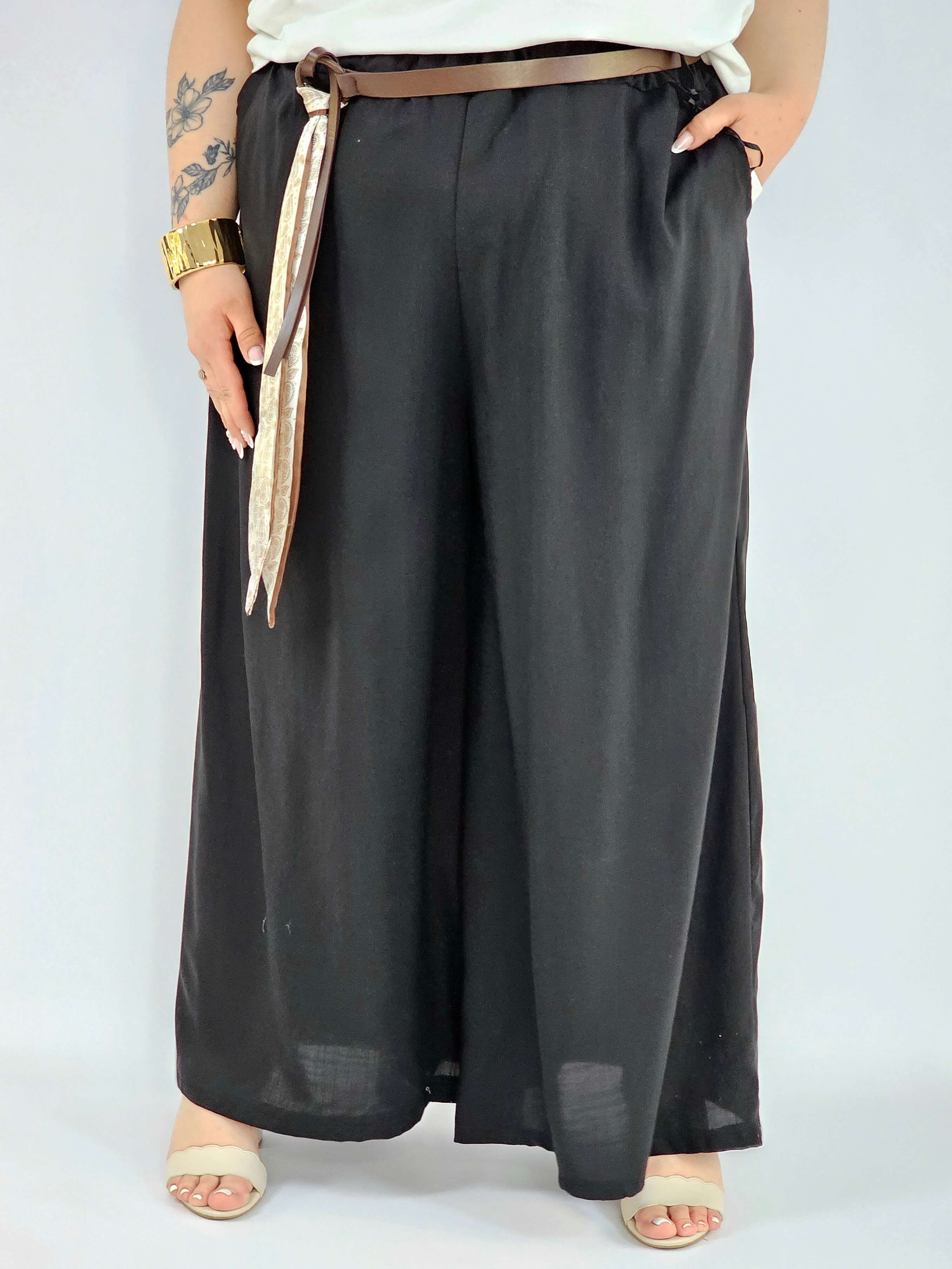 Spodnie plus size szerokie z gumką w pasie i wiązaniem XXL Stylowa XL