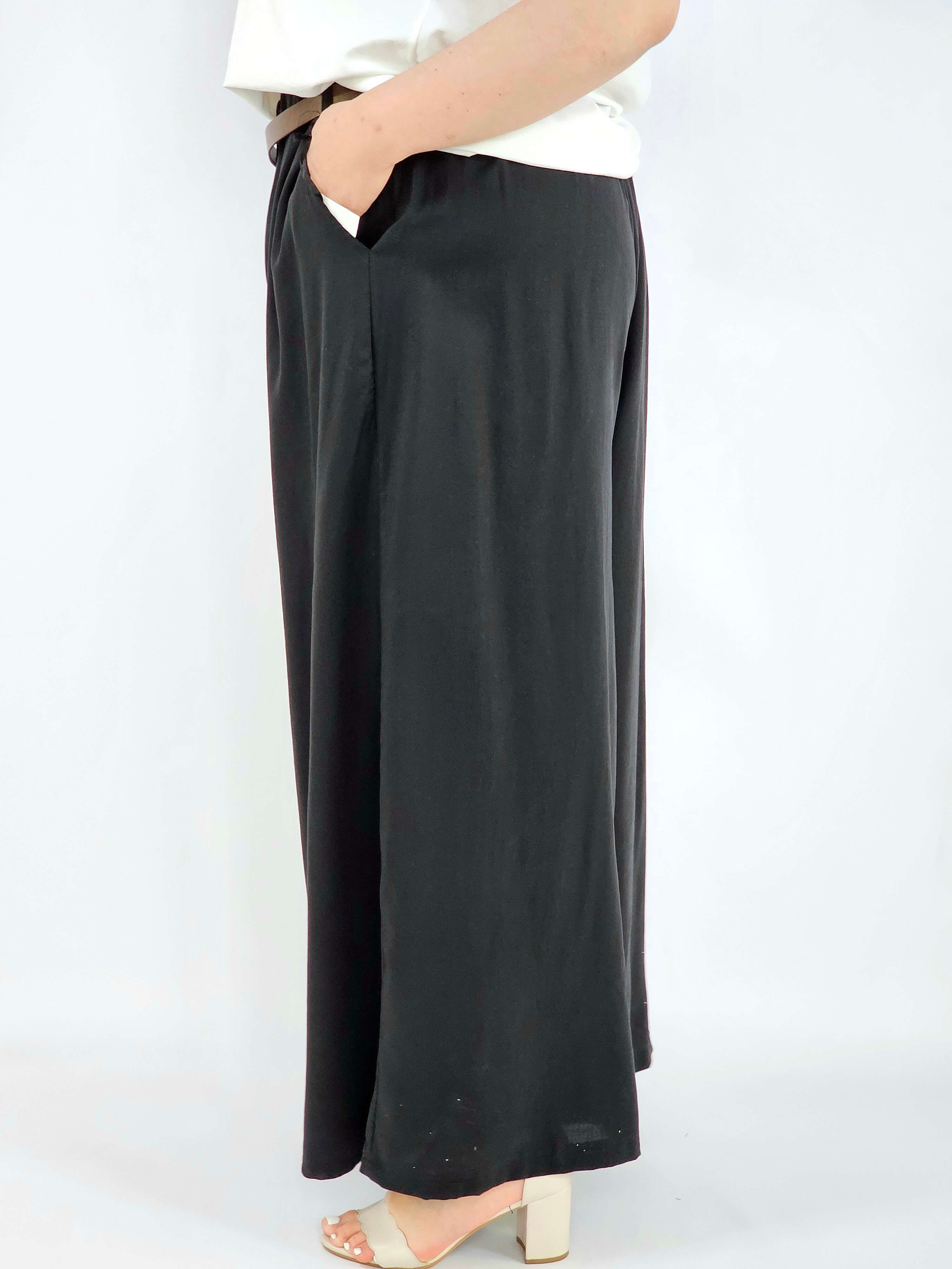 Spodnie plus size szerokie z gumką w pasie i wiązaniem XXL Stylowa XL