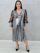 Srebrna sukienka z cekinami i tiulem Stylowa XL