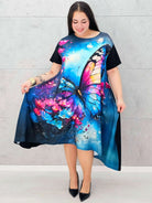 Sukienka StylowaXL z motylem – kolorowa sukienka plus size o asymetrycznym kroju Stylowa XL