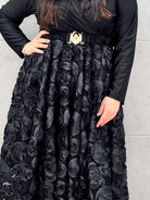 Sukienka elegancka czarna z kopertową górą i kwiatowym dołem – wyjątkowa moda plus size Stylowa XL