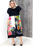 Sukienka midi plus size – elegancka długość i kobiecy krój dla każdej sylwetki Stylowa XL