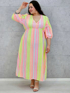 Sukienka midi plus size z głębokim dekoltem i kolorowym wzorem Stylowa XL