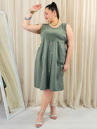 Sukienka odcinana pod biustem dołem ozdobne guziczki w kilku kolorach Stylowa XL