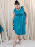 Sukienka odcinana pod biustem dołem ozdobne guziczki w kilku kolorach Stylowa XL