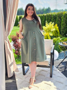 Sukienka odcinana pod biustem dołem ozdobne guziczki w kilku kolorach Stylowa XL