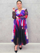 Sukienka plisowana z kopertowym dekoltem – eksplozja barw i kobiecości Stylowa XL