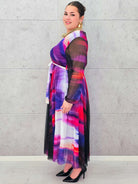 Sukienka plisowana z kopertowym dekoltem – eksplozja barw i kobiecości Stylowa XL