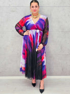 Sukienka plisowana z kopertowym dekoltem – eksplozja barw i kobiecości Stylowa XL