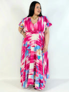 Sukienka plus size artystyczna z kwiatowym akcentem – lekkość i kobiecość w ruchu Stylowa XL