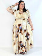 Sukienka plus size artystyczna z kwiatowym akcentem – lekkość i kobiecość w ruchu Stylowa XL