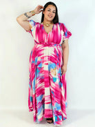 Sukienka plus size artystyczna z kwiatowym akcentem – lekkość i kobiecość w ruchu Stylowa XL