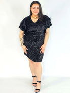 Sukienka plus size cekinowa czarna z falbankami – elegancka sukienka XXL Stylowa XL