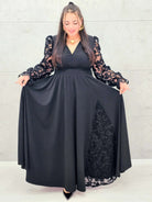 Sukienka plus size czarna elegancka z koronkowymi rękawami i głębokim dekoltem – wyjątkowa moda XXL Stylowa XL