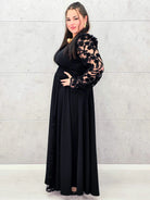 Sukienka plus size czarna elegancka z koronkowymi rękawami i głębokim dekoltem – wyjątkowa moda XXL Stylowa XL