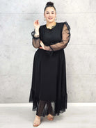 Sukienka plus size czarna maxi z transparentnymi rękawami – elegancja i lekkość Stylowa XL
