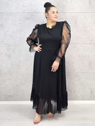 Sukienka plus size czarna maxi z transparentnymi rękawami – elegancja i lekkość Stylowa XL