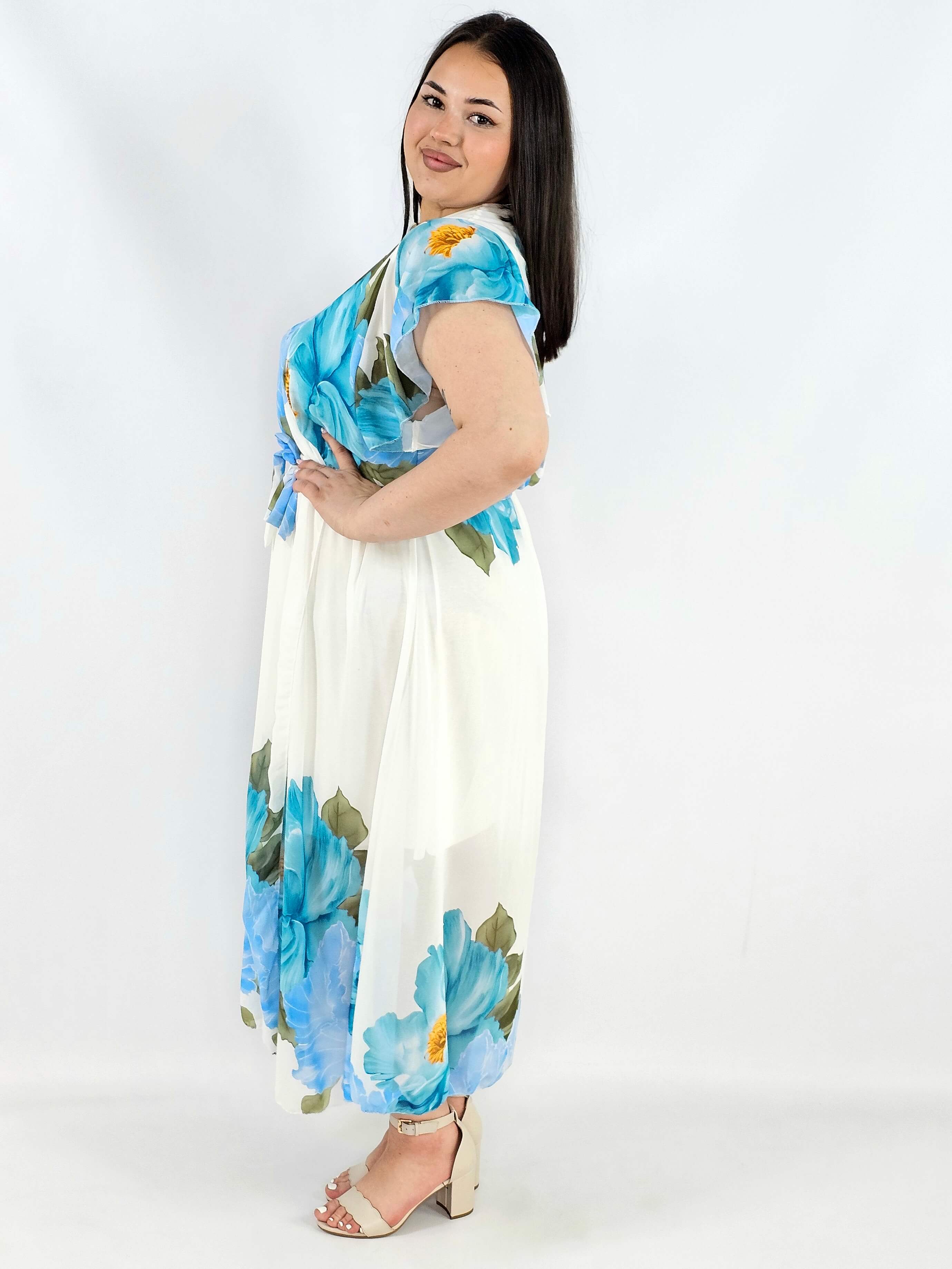 Sukienka plus size kopertowa XXL – elegancka i zwiewna propozycja na komunię i wesele Stylowa XL