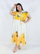 Sukienka plus size kopertowa XXL – elegancka i zwiewna propozycja na komunię i wesele Stylowa XL
