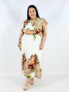 Sukienka plus size kopertowa XXL – elegancka i zwiewna propozycja na komunię i wesele Stylowa XL