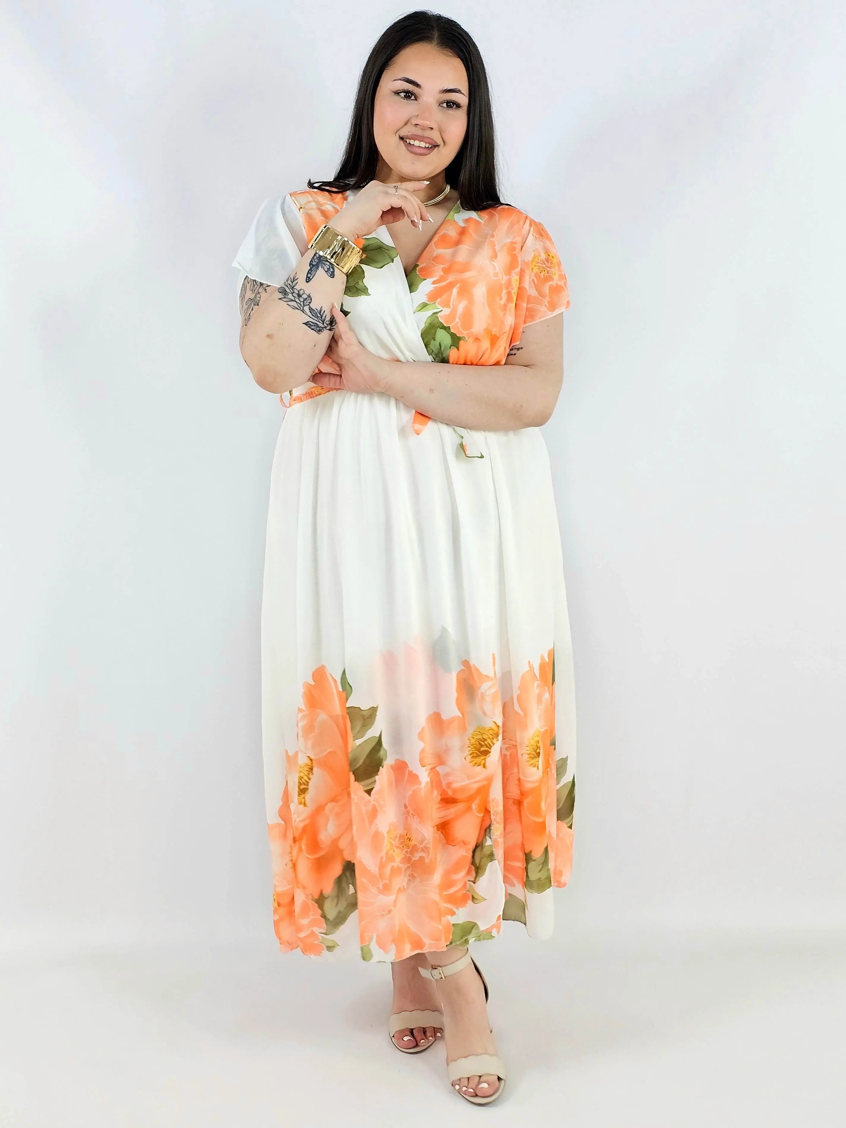 Sukienka plus size kopertowa XXL – elegancka i zwiewna propozycja na komunię i wesele Stylowa XL