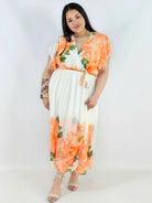 Sukienka plus size kopertowa XXL – elegancka i zwiewna propozycja na komunię i wesele Stylowa XL