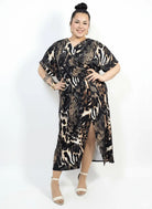 Sukienka plus size kopertowa midi z rozcięciem Stylowa XL