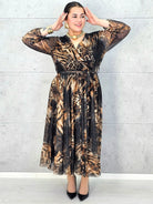 Sukienka plus size kopertowa w panterkowy wzór – elegancja i lekkość Stylowa XL