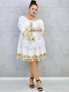 Sukienka plus size boho z koronką i frędzlami Stylowa XL