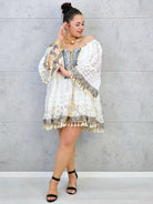 Sukienka plus size koronkowa boho z frędzlami – biała Stylowa XL