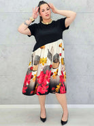 Sukienka plus size midi z kwiatowym dołem – elegancja dla kobiet XXL Stylowa XL