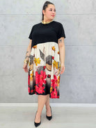 Sukienka plus size midi z kwiatowym dołem – elegancja dla kobiet XXL Stylowa XL