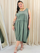 Sukienka plus size o swobodnym fasonie z kieszeniami Stylowa XL