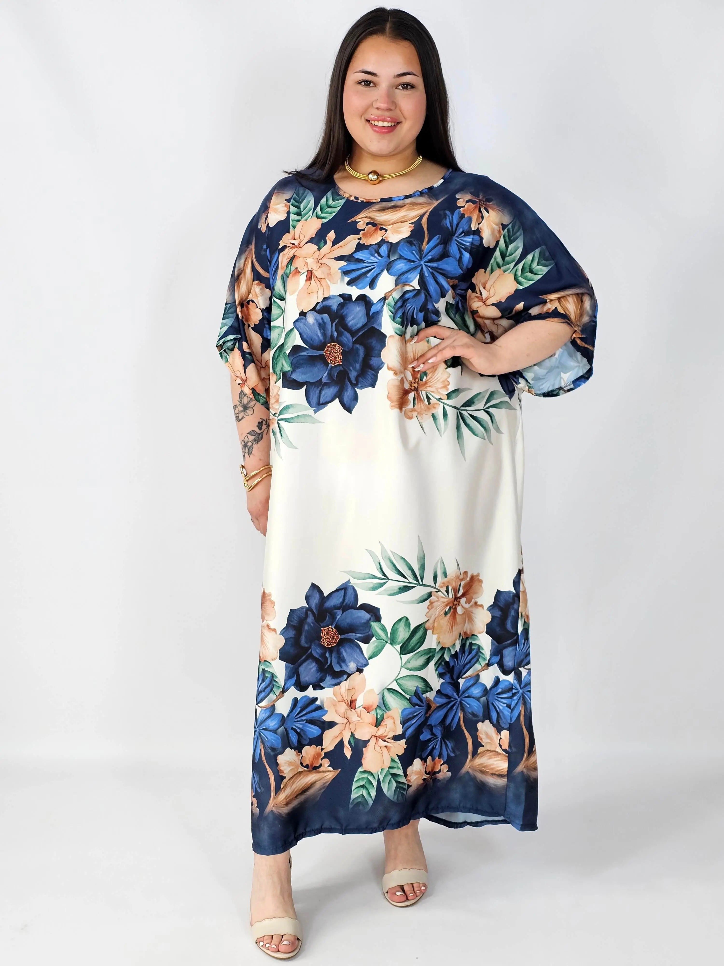 Sukienka plus size satynowa – elegancka sukienka XXL z połyskiem Stylowa XL