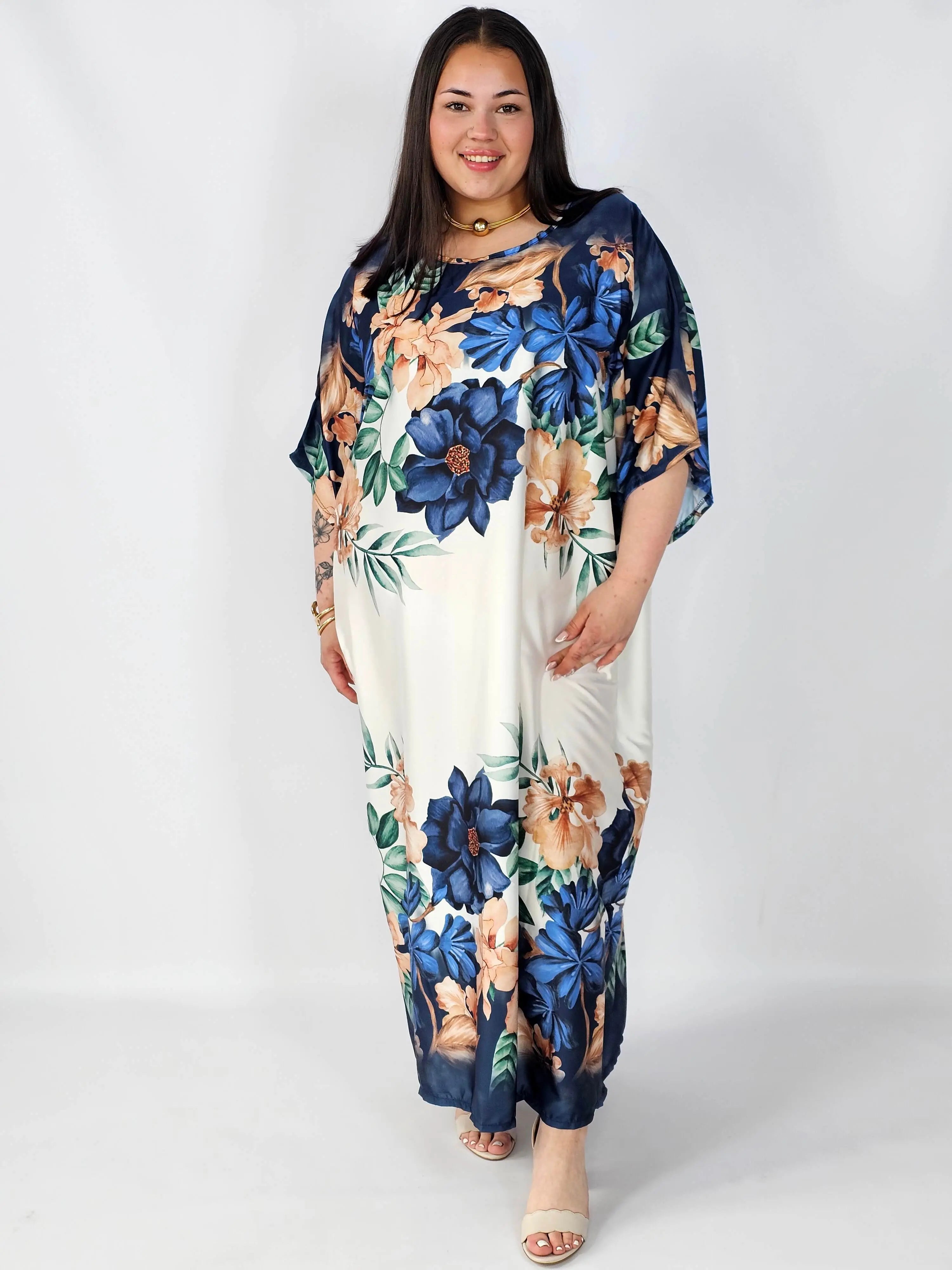 Sukienka plus size satynowa – elegancka sukienka XXL z połyskiem Stylowa XL