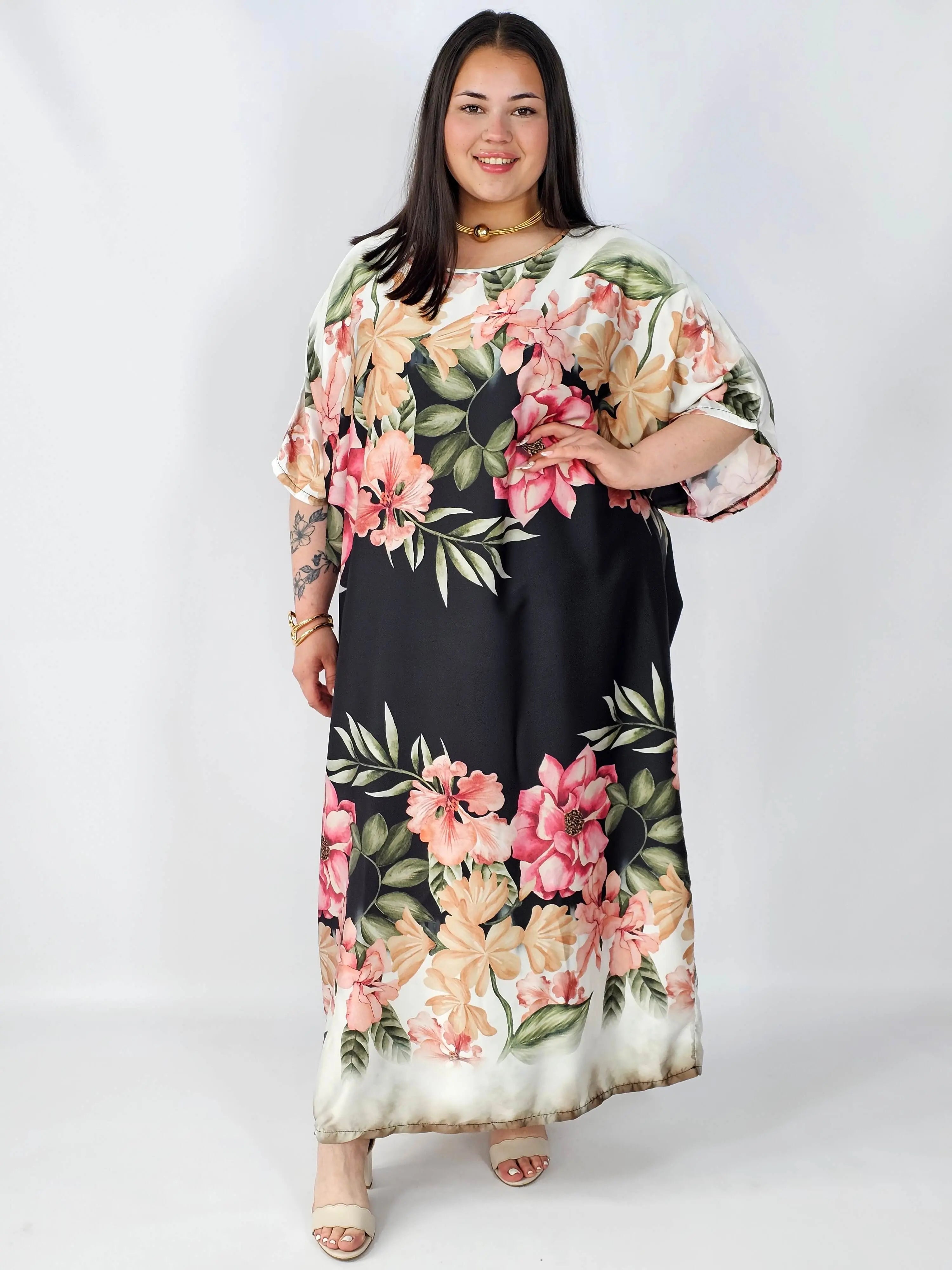 Sukienka plus size satynowa – elegancka sukienka XXL z połyskiem Stylowa XL