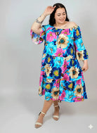 Sukienka plus size w kwiaty – hiszpanka z falbaną, kolorowa i lekka Stylowa XL