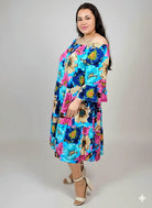 Sukienka plus size w kwiaty – hiszpanka z falbaną, kolorowa i lekka Stylowa XL