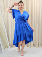 Sukienka plus size z kopertowym dekoltem – asymetryczna sukienka damska XXL Stylowa XL