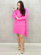 Sukienka plus size z kopertowym dekoltem i wiązaniem – elegancja i kobiecość w wersji XL Stylowa XL