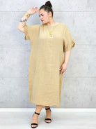 Sukienka plus size z luźnym fasonem i efektownym wiązaniem na plecach Stylowa XL