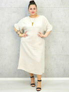 Sukienka plus size z luźnym fasonem i efektownym wiązaniem na plecach Stylowa XL